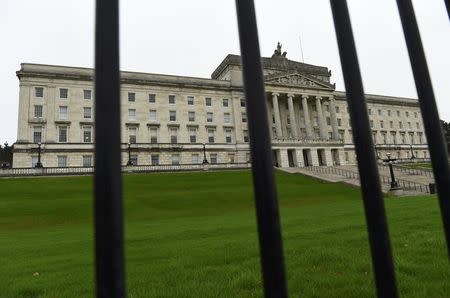 The Parliament Buildings at Stormont are seen behind railings, a day after deputy first minister Martin McGuinness resigned, throwing the devolved joint administration into crisis, in Belfast Northern Ireland, January 10, 2017. REUTERS/Clodagh Kilcoyne
