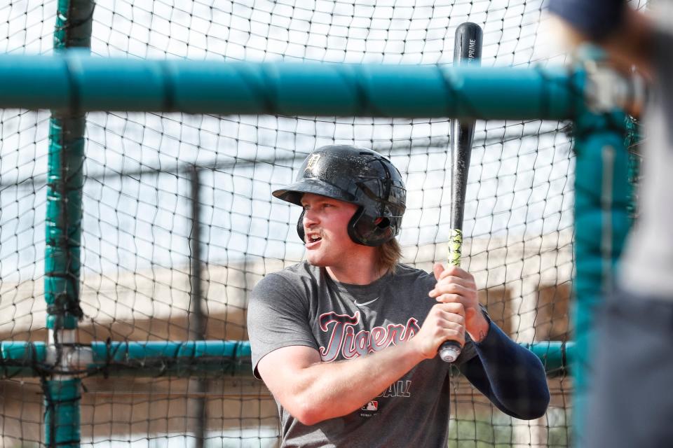 Outfielder Cam Gibson practices in the batting cage during Detroit Tigers spring training at TigerTown in Lakeland, Fla., Tuesday, Feb. 18, 2020.