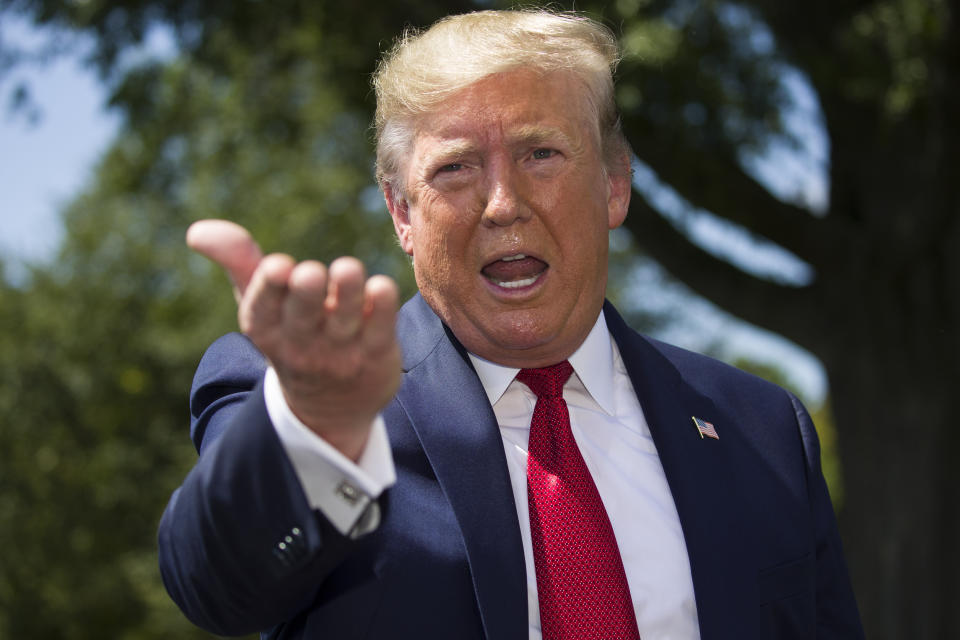 President Donald Trump speaks with reporters on the South Lawn of the White House, Wednesday, Aug. 21, 2019. (AP Photo/Alex Brandon)