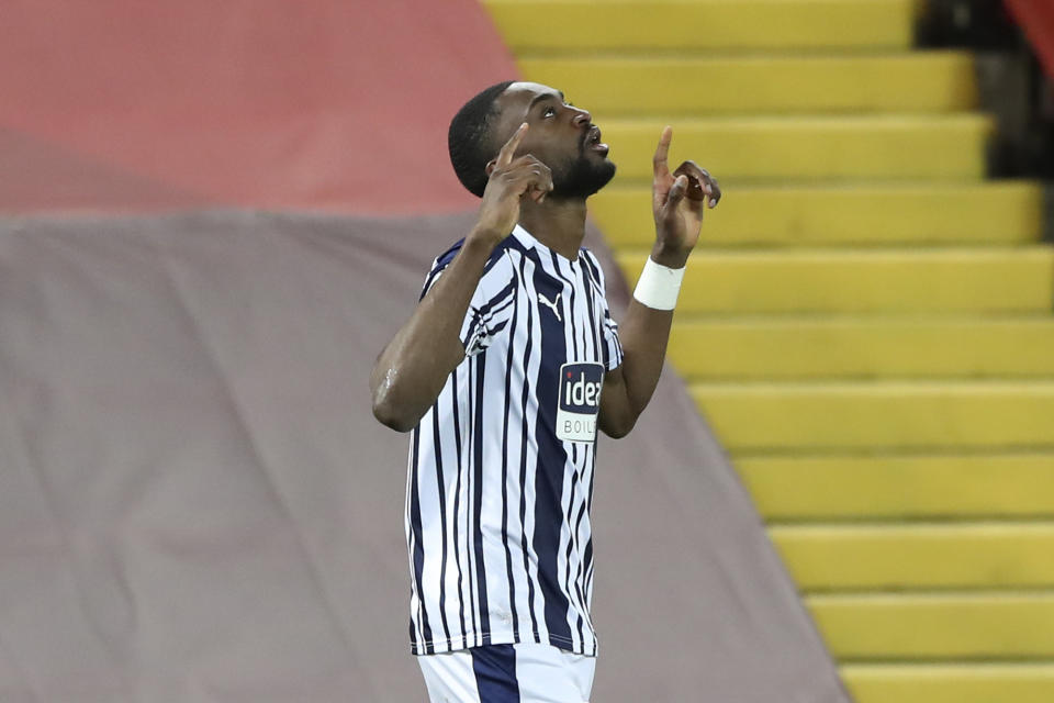 West Bromwich Albion's Semi Ajayi celebrates after scoring his side's first goal during an English Premier League soccer match between Liverpool and West Bromwich Albion at the Anfield stadium in Liverpool, England, Sunday Dec. 27, 2020. (Nick Potts/Pool via AP)