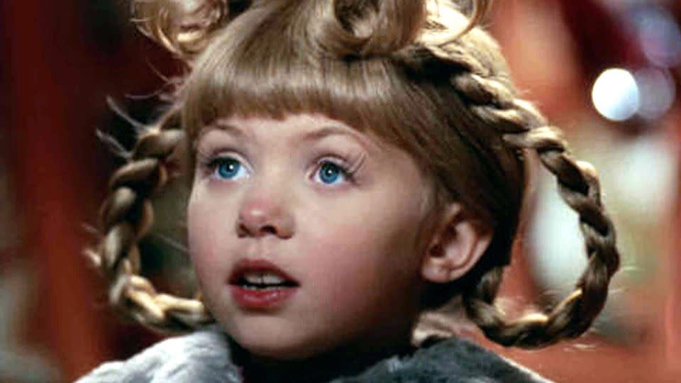 Curls, plaits and a ponytail that took the "up-do" to new heights, literally: this hairstyle for Taylor Momsen's character Cindy Lou Who had it all. - AJ Pics/Alamy Stock Photo