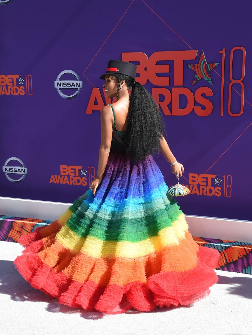 Janelle Monáe arrives at the 2018 BET Awards in a rainbow-printed dress on June 24, 2018.