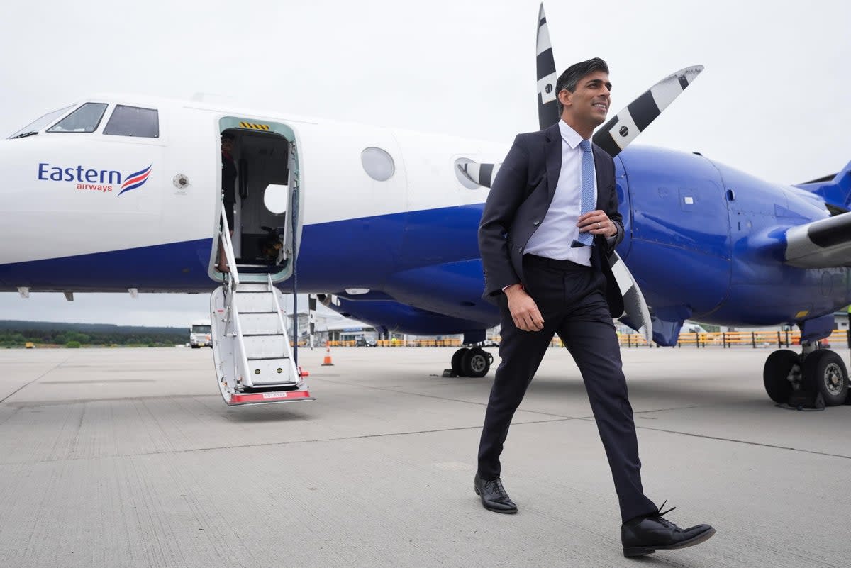 Prime Minister Rishi Sunak arrives at Inverness airport on the general election campaign trail (Stefan Rousseau/PA Wire)