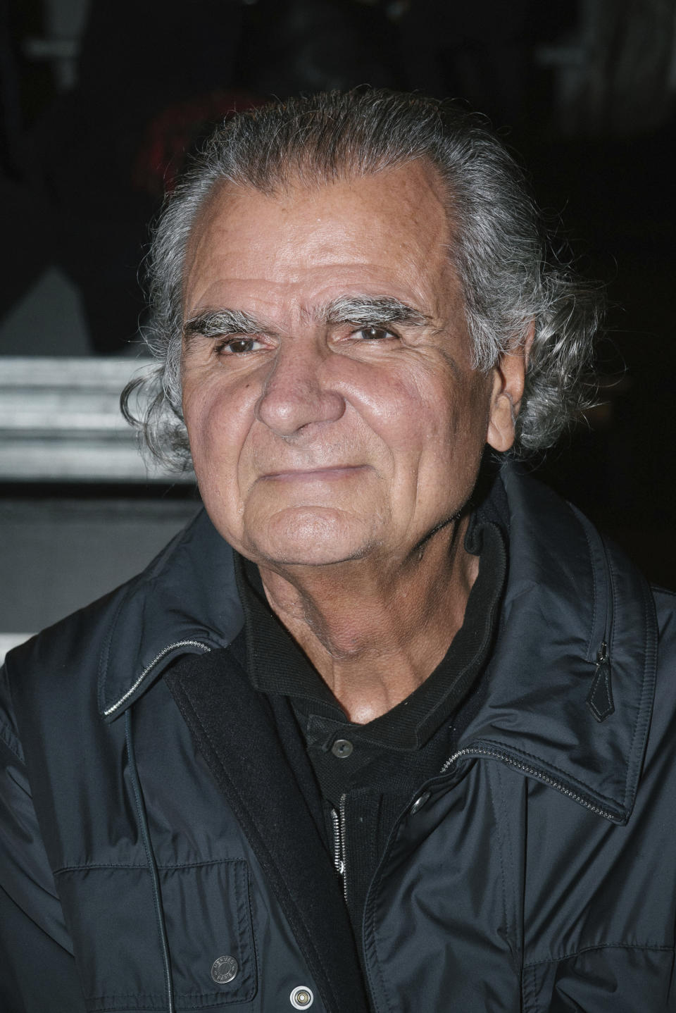 Patrick Demarchelier appears at the Saint Laurent Spring-Summer 2016 ready-to-wear fashion collection, presented during the Paris Fashion Week on Oct. 5, 2015. Demarchelier, the French-born photographer known for his high fashion images of top models and celebrities, including Princess Diana, has died at age 78. (AP Photo/Zacharie Scheurer, File)