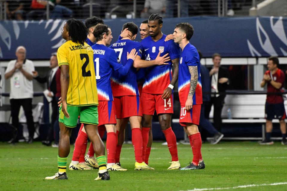 USMNT players celebrate a goal scored by Haji Wright (14) against Jamaica at AT&T Stadium.