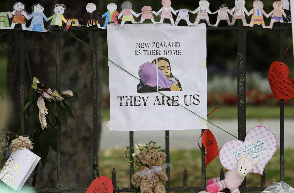 A poster featuring a drawing of Prime Minister Jacinda Ardern hangs on a wall at the Botanical Gardens in Christchurch. Source: AP