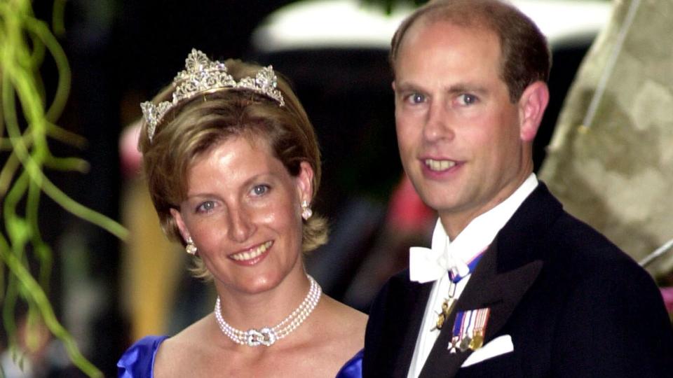 Duchess Sophie in a blue dress and a tiara with her husband Prince Edward