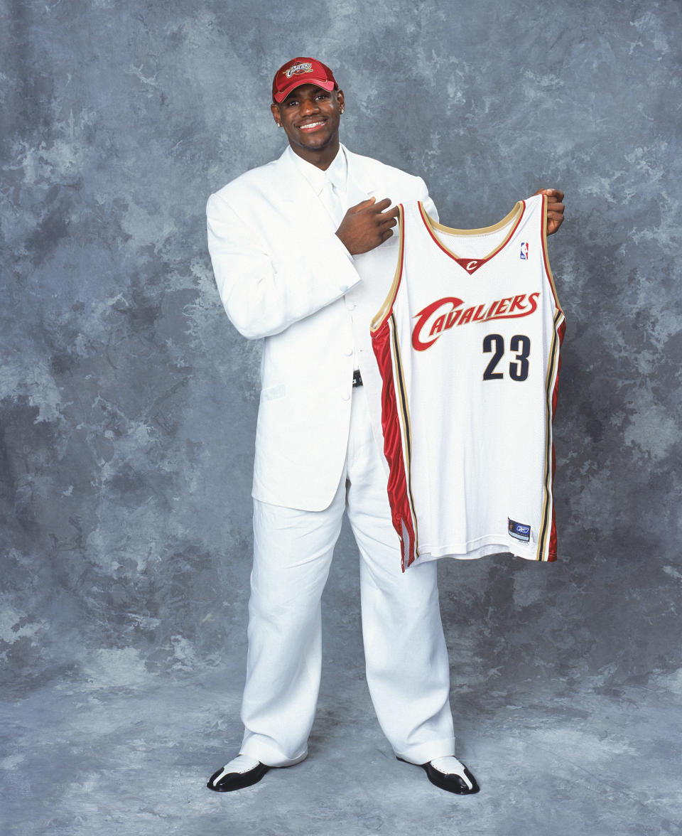 NEW YORK - JUNE 26: LeBron James of the Cleveland Cavaliers poses with his jersey during the 2003/2004 NBA Draft Portrait at Paramount Theatre Madison Square Garden on June 26, 2003 in New York, New York.&nbsp;