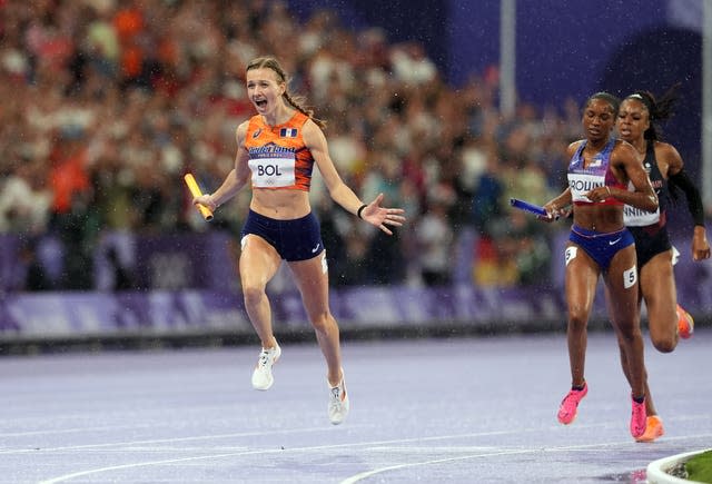 Femke Bol celebrating crossing the finish line