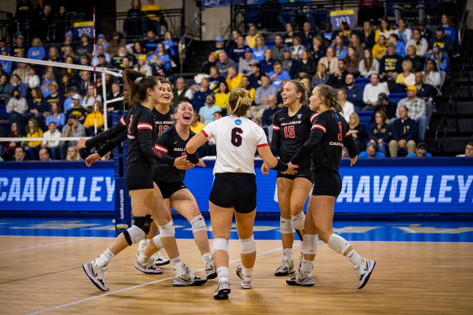 Ball State celebrates a point against Marquette during the first round of the NCAA Women's Volleyball Tournament at Marquette's Al McGuire Center Thursday, Dec. 1, 2022.