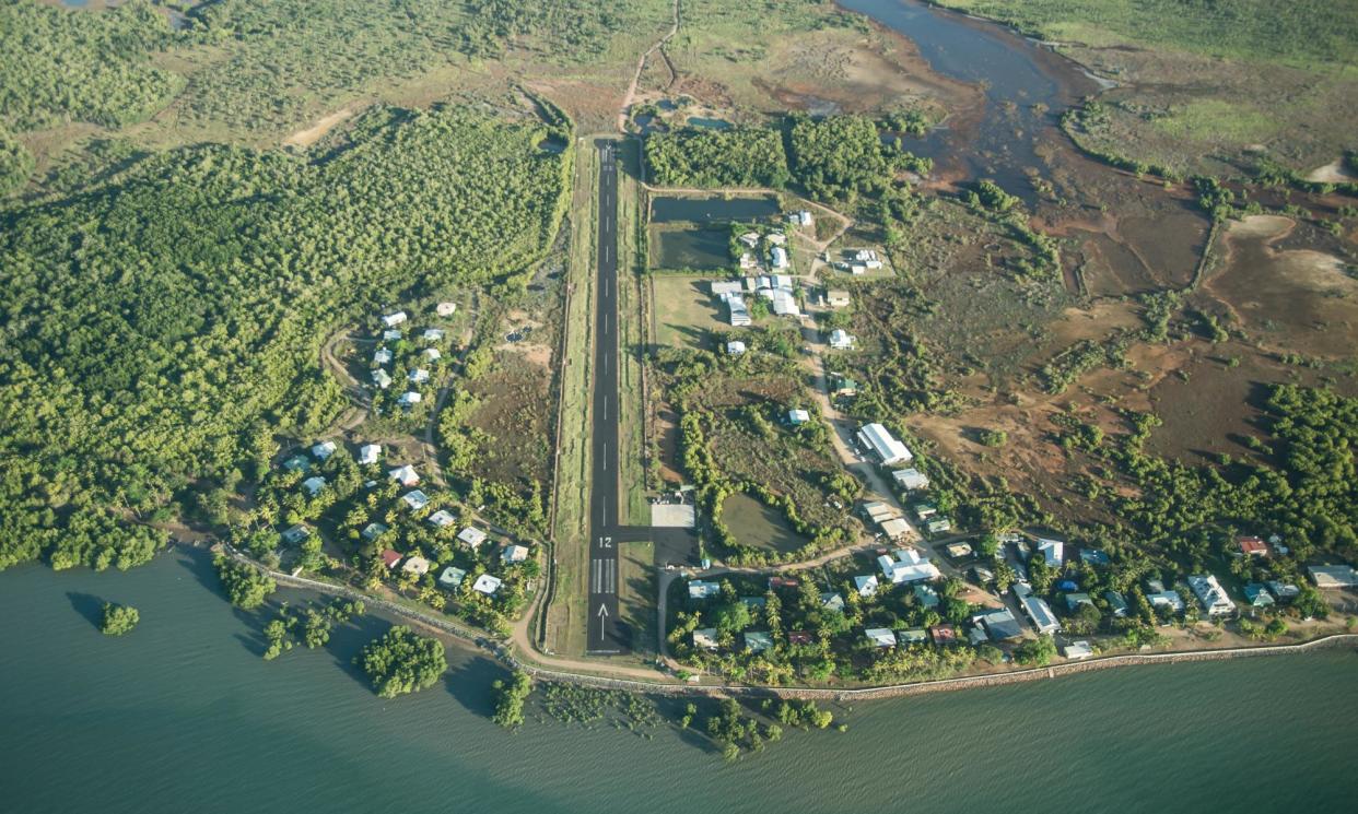 <span>The group, believed to be Rwandan, were picked up on Saibai Island. It is unknown whether they have claimed asylum in Australia.</span><span>Photograph: Aaron Bunch/AAP</span>
