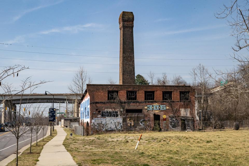 The old cotton mill building in the River Arts District was approved for demolition in August 2023, according to city documents.