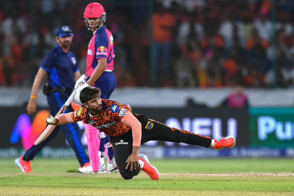 Sunrisers Hyderabad's Nitish Kumar Reddy fields the ball during the Indian Premier League (IPL) Twenty20 cricket match between Sunrisers Hyderabad and Rajasthan Royals at the Rajiv Gandhi International Stadium in Hyderabad on May 2, 2024.