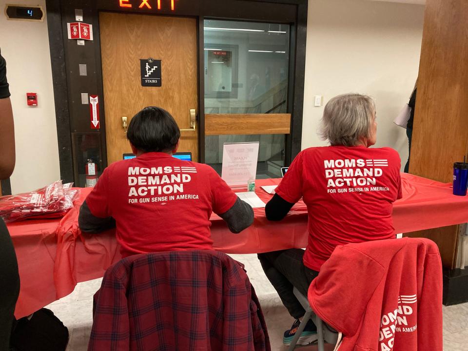 Advocates of reducing gun violence in the United State hand out information about proposed legislation at the Massachusetts Statehouse during the groups advocacy day Wednesday.