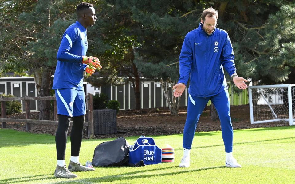 Petr Cech offers guidance to Chelsea goalkeeper Edouard Mendy - GETTY IMAGES