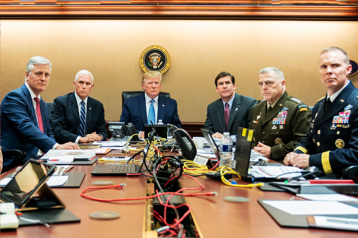 Donald Trump; military personnel Shealah Craighead/The White House via Getty Images