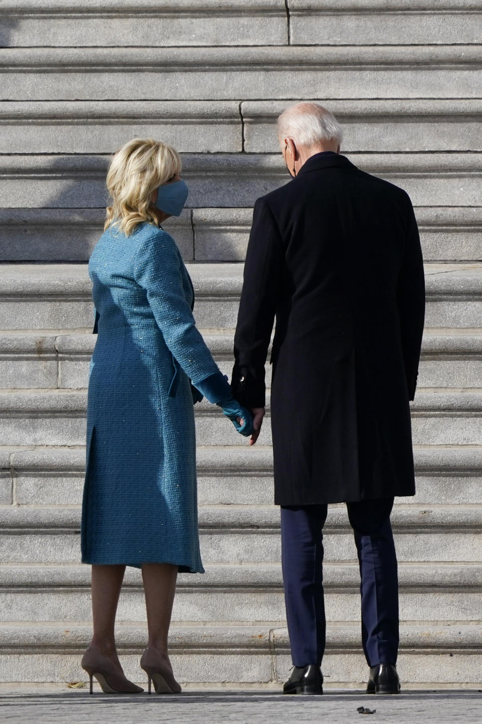 President-elect Joe Biden and his wife Jill Biden arrive at the steps of the U.S. Capitol for the start of the official inauguration ceremonies, in Washington, Wednesday, Jan. 20, 2021. (AP Photo/J. Scott Applewhite)