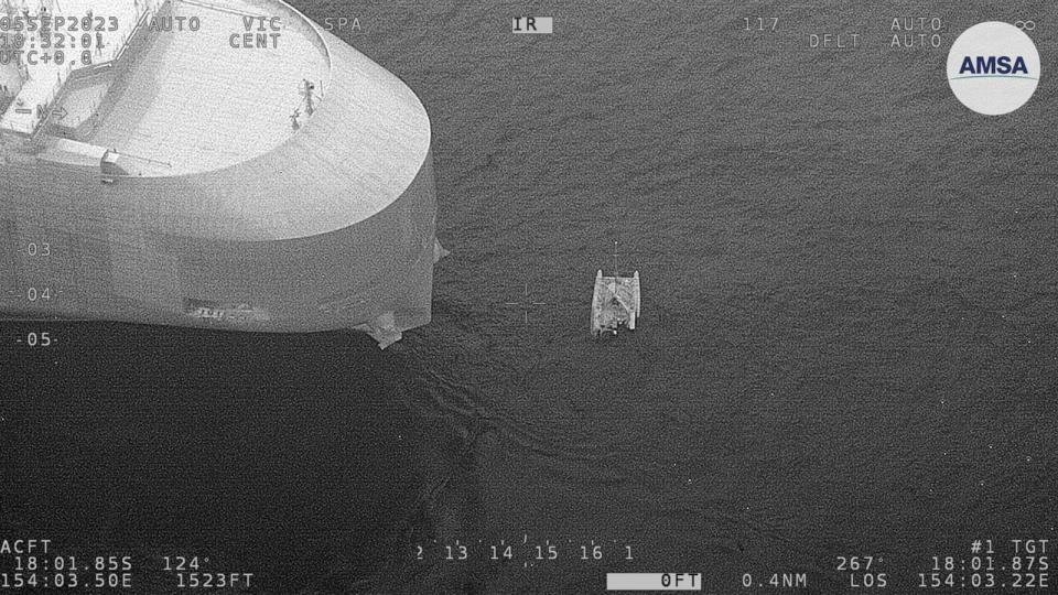 PHOTO: A 9-meter inflatable catamaran Tion with three passengers that was rescued in the coral sea Australian Maritime Safety Authority (Australian Maritime Safety Authority)