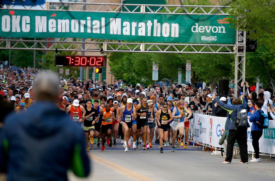 Runners begin the 2022 Oklahoma City Marathon in downtown. Registration is open for the 2023 race at OKCMarathon.com.