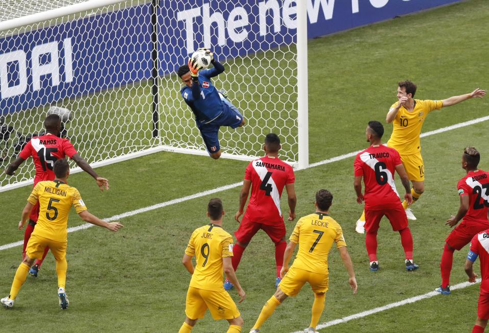 <p>Peru goalkeeper Pedro Gallese catches the ball </p>