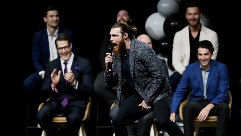 Utah hockey forward Liam O'Brien enthusiastically yells into the mic as he introduces himself as thousands attend the NHL event at the Delta Center in Salt Lake City, as Utah’s NHL hockey team is introduced to fans on Wednesday, April 24, 2024.