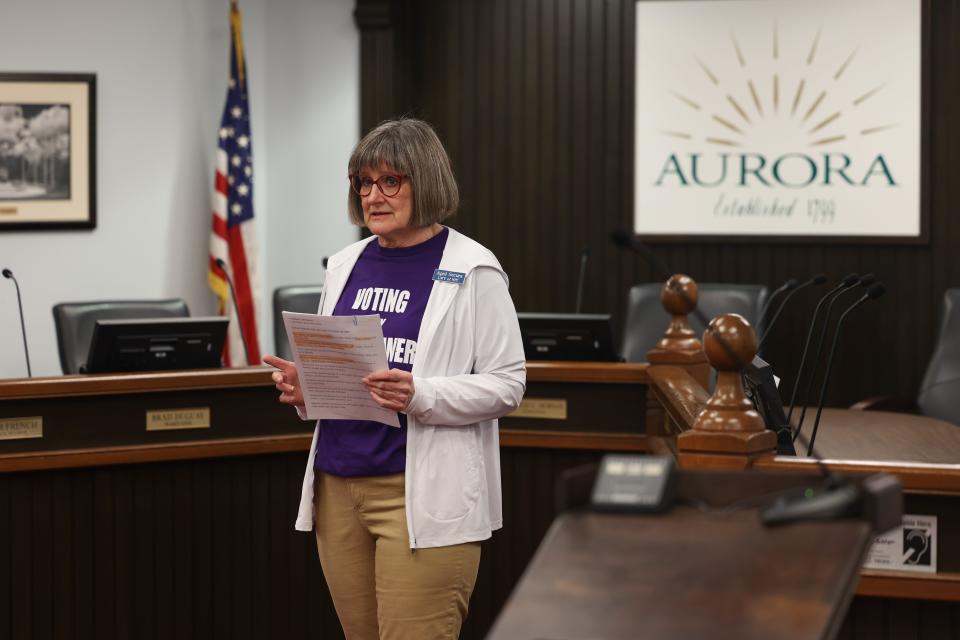 April Secura of the League of Women Voters of Northern Portage County makes opening remarks at one of several events sponsored by the organization to educate voters about changes in voting requirements.