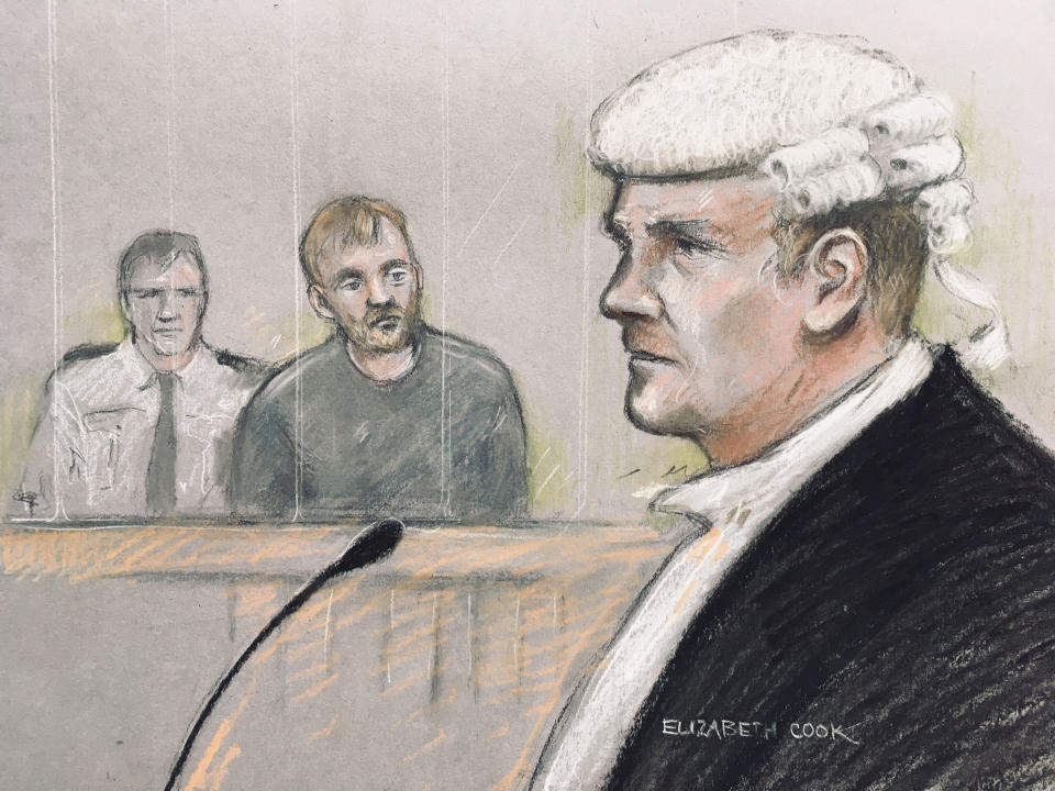 Court artist sketch by Elizabeth Cook of Stephen Nicholson, 25, (centre) of no fixed address in the dock at Winchester Crown Court, facing William Mousley QC, prosecuting, where he is accused of repeatedly stabbing 13-year-old Lucy McHugh in the neck and upper body in woodland at Southampton Sports Centre, before leaving her to die.