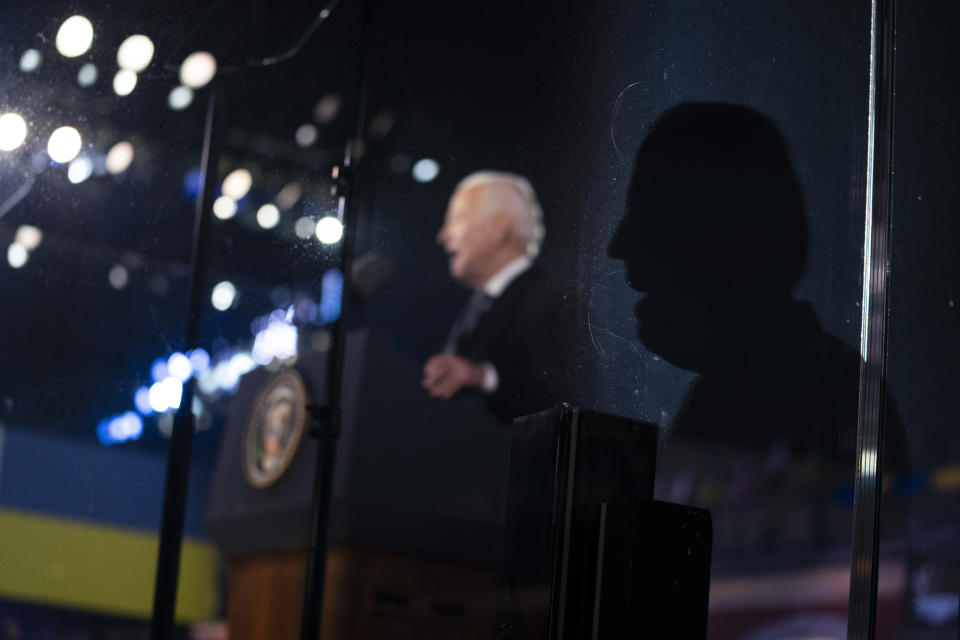 FILE - President Joe Biden delivers a speech marking the one-year anniversary of the Russian invasion of Ukraine, at the Royal Castle Gardens, Tuesday, Feb. 21, 2023, in Warsaw. For years, campaigns in both parties have used machine learning and sophisticated artificial intelligence tools to collect, analyze and automate data. But disinformation experts have amplified warnings in recent months about the threats posed by the advent of powerful generative AI programs, which allow the rapid proliferation of fake images, video or audio. (AP Photo/ Evan Vucci, File)