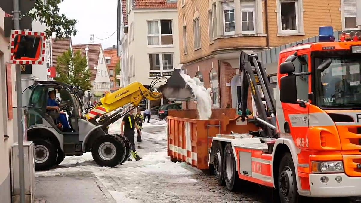 A snowplow picks up hail on the streets in Reutlingen, southern Germany, on August 4, 2023. (NEWS5/AFP via Getty Images)