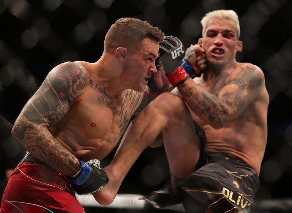 Dustin Poirier twice knocked down Oliveira but was submitted by the Brazilian in Round 3 (Getty Images)