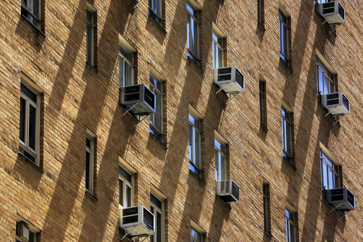 <span>A likely spike in utility bills will disproportionately affect low-income families during the hot summer months.</span><span>Photograph: Bruce Yuanyue Bi/Getty Images</span>