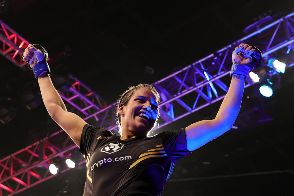 LAS VEGAS, NEVADA - DECEMBER 11: Julianna Pena celebrates after defeating Amanda Nunes of Brazil to win the women's bantamweight title during the UFC 269 event at T-Mobile Arena on December 11, 2021 in Las Vegas, Nevada. (Photo by Carmen Mandato/Getty Images)