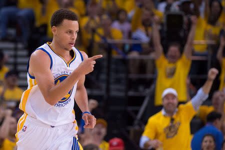 May 3, 2015; Oakland, CA, USA; Golden State Warriors guard Stephen Curry (30) celebrates during the second quarter in game one of the second round of the NBA Playoffs against the Memphis Grizzlies at Oracle Arena. Mandatory Credit: Kyle Terada-USA TODAY Sports