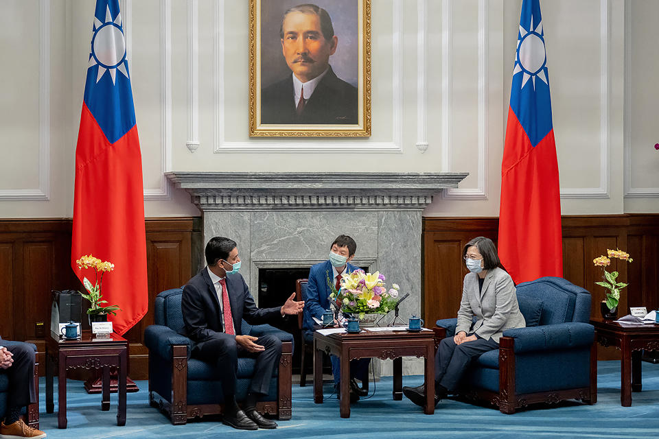 In this photo released by the Taiwan Presidential Office, Taiwan's President Tsai Ing-wen at right speaks with California Rep. Ro Khanna during a meeting at the Presidential Office in Taipei, Taiwan on Tuesday, Feb. 21, 2023. A delegation of U.S. lawmakers led by Khanna on Tuesday met with Taiwan's president, who promised to deepen military cooperation between the two sides despite objections from China, which claims the island as its own territory. (Taiwan Presidential Office via AP)