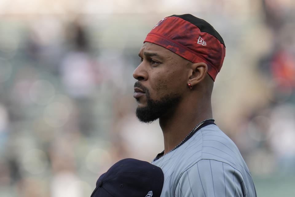 Minnesota Twins' Byron Buxton stands for The Star-Spangled Banner before a baseball game against the Chicago White Sox, Monday, April 29, 2024, in Chicago. (AP Photo/Erin Hooley)