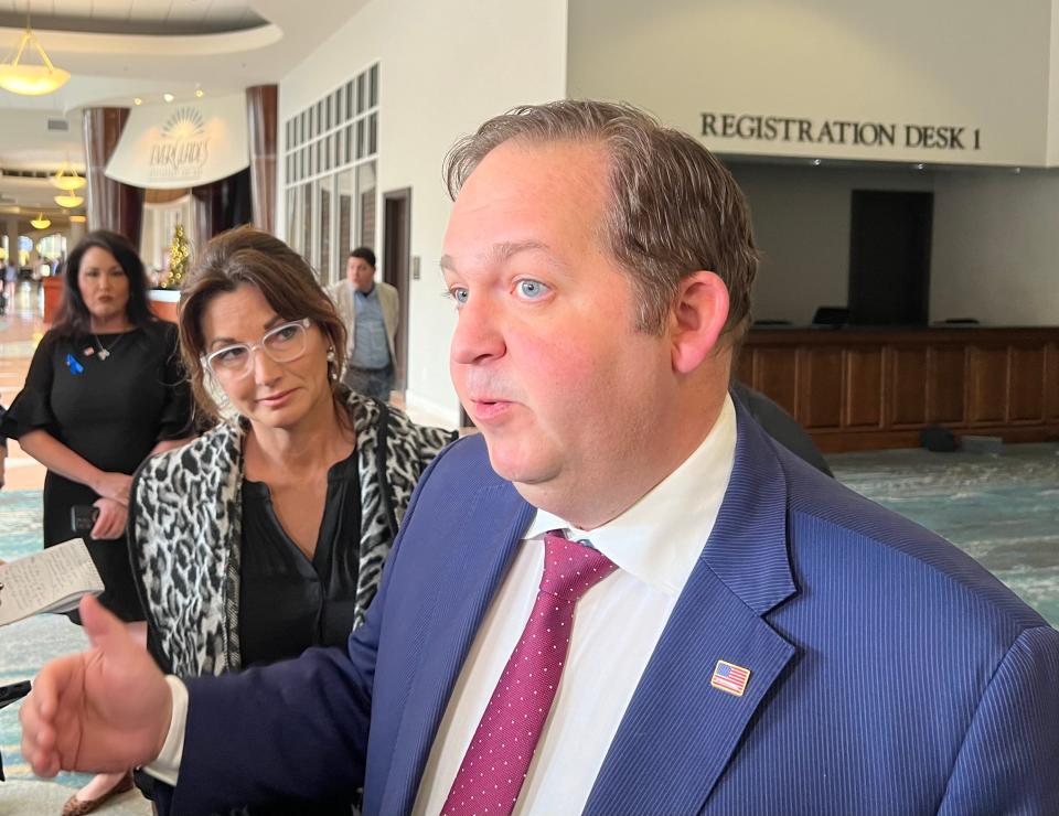 Florida GOP Vice Chair Evan Power speaks to reporters after an emergency meeting of the party's executive board Sunday where Chair Christian Ziegler was stripped of his authority amid a rape allegation.