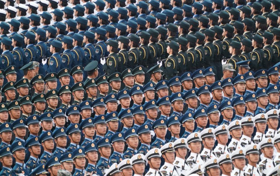 Chinese soldiers take part in a parade in Beijing back in September 2019.