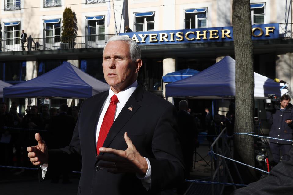 United States Vice President Mike Pence briefs the media during the Munich Security Conference in Munich, Germany, Saturday, Feb. 16, 2019. (AP Photo/Matthias Schrader)