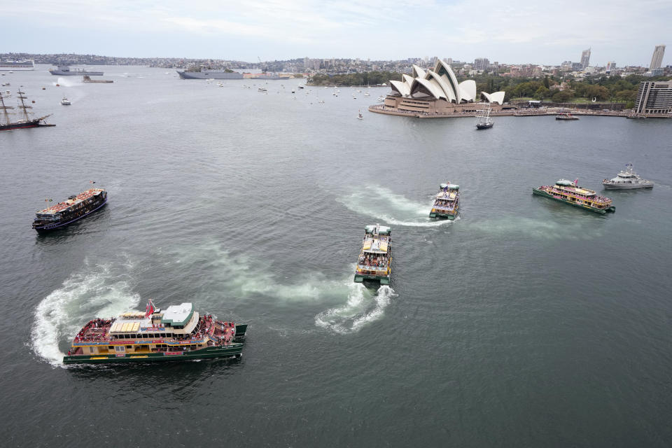 Ferries race on Sydney Harbour during Australia Day celebrations in Sydney, Friday, Jan. 26, 2024. (AP Photo/Rick Rycroft)