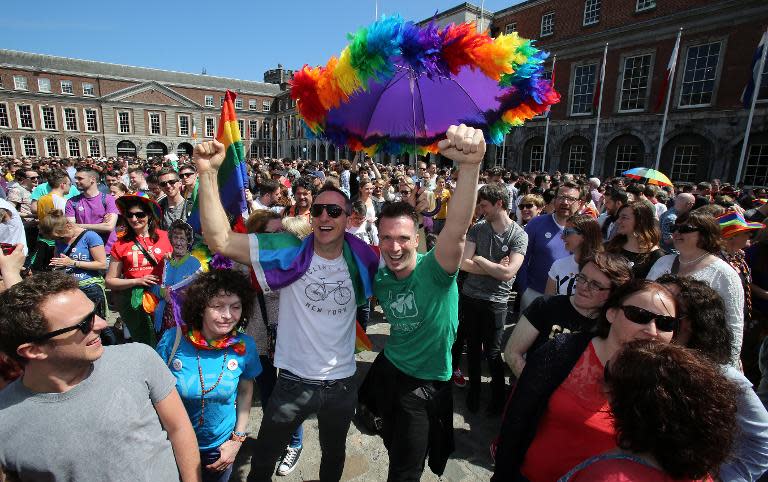 Ireland celebrated a historic referendum approving gay marriage, as the once all-powerful Catholic Church reflected on the need for a "reality check" to keep in touch with changing times