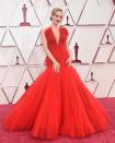 <p>Amanda Seyfried continued her Old Hollywood streak in a bold red Giorgio Armani flared gown featuring a deep V-neckline. </p>