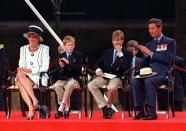 <p>Prince Charles, Prince William, Prince Harry, and Princess Diana appear at a parade during V.J. Day commemorations</p>