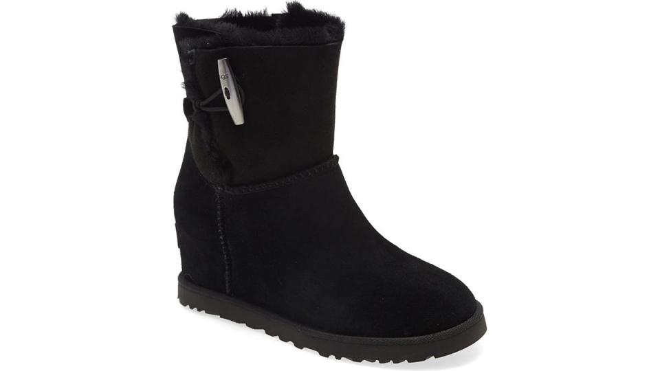 These Ugg boots feature a wedge and a plush shearling interior.