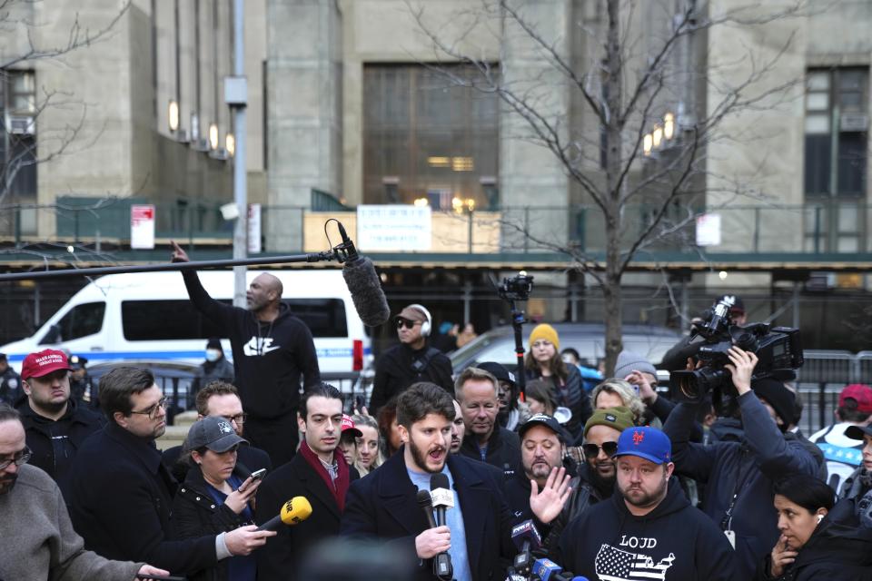 Gavin Wax, leader of the New York Young Republicans, addresses the press during a rally in support of former President Donald Trump and in opposition to the potential criminal indictment sought by New York County District Attorney Alvin Bragg on Monday, March 20, 2023, in front of the New York Criminal Court building in New York. (AP Photo/Bryan Woolston)