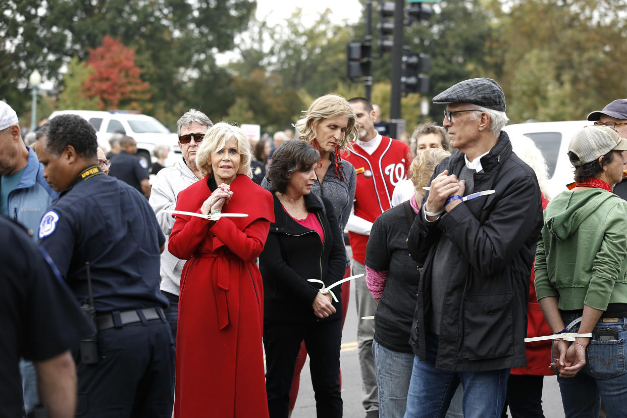 WASHINGTON, DC - OCTOBER 25: Actors Jane Fonda and Ted Danson are arrested during the "Fire Drill Friday" Climate Change Protest on October 25, 2019 in Washington, DC . Protesters demand Immediate Action for a Green New Deal. Clean renewable energy by 2030, and no new exploration or drilling for Fossil Fuels.  (Photo by John Lamparski/Getty Images)