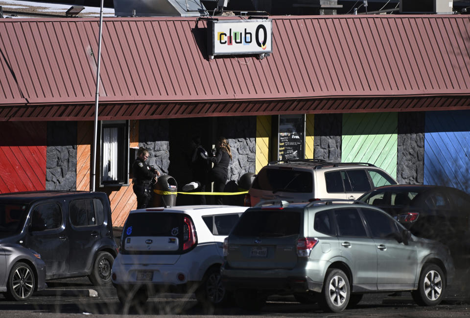 Police enter Club Q in Colorado Springs, Colo., Sunday morning, Nov. 20, 2022, as they continue to investigate the Saturday night shooting that left several people dead and multiple others injured. (Christian Murdock/The Gazette via AP)