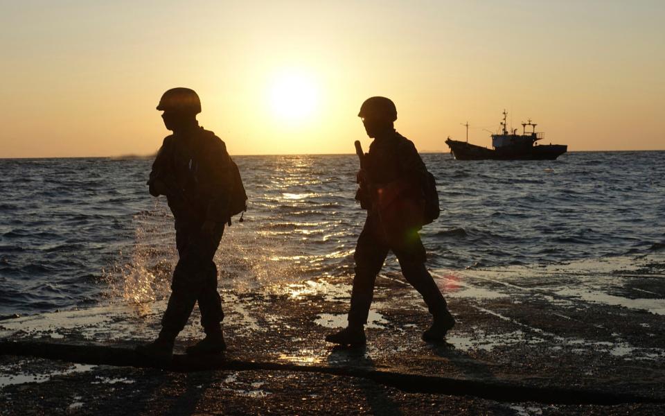 South Korean marine soldiers patrol on Yeonpyeong island - Yonhap