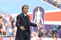 Manchester City manager Roberto Mancini reacts on the touchline