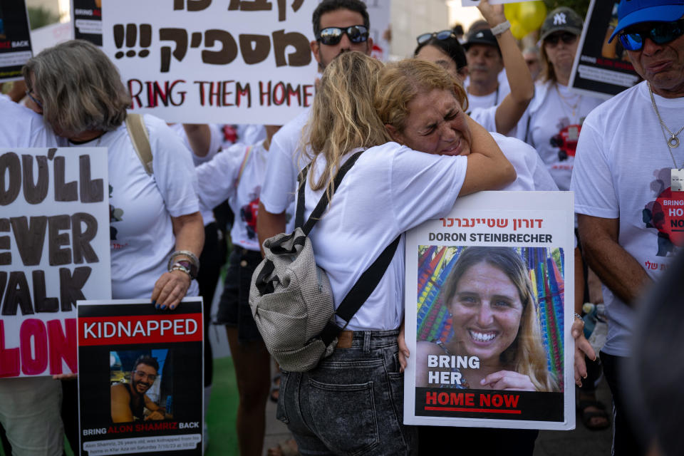 Family and friends of   Kibbutz Kfar Aza residents who were kidnapped by Hamas militants during the October 7 terror attack on Israel rally outside The Kirya, the Tel Aviv headquarters of the Israel Defense Forces, Oct. 26, 2023. / Credit: Alexi Rosenfeld/Getty Images