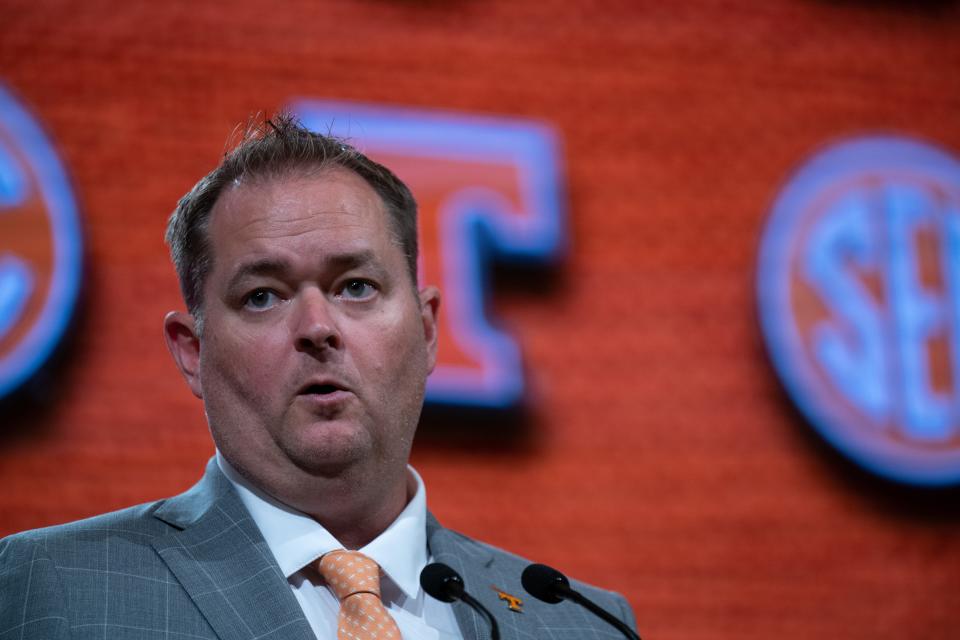 Tennessee coach Josh Heupel speaks at SEC media days Thursday in Nashville. The former Oklahoma quarterback wants no discussion about the appropriate shade of orange or the correct school acronym when it comes to comparing Tennessee and Texas. “There's only one real UT and one right shade of orange," he said.